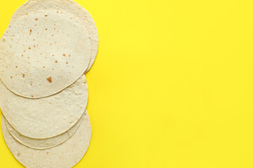 Thin lavash on yellow background