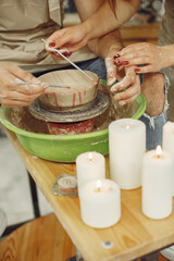 Young couple at artwork in pottery