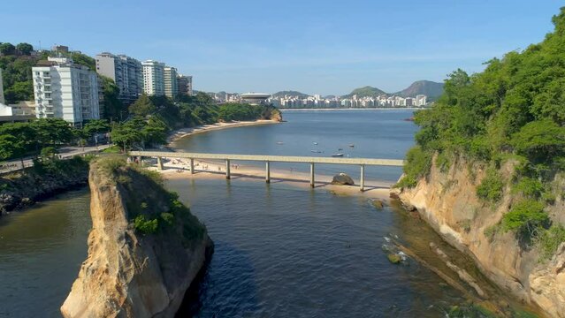 RIO DE JANEIRO, BRASIL - MAY, 2023: Drone aerial view of of a famous landmark Boa Viagem beach and Guanabara Bay. White sand on the shore, favorite vacation spot.