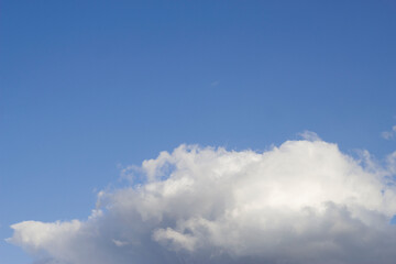 Naklejka na ściany i meble blue sky with textured spring clouds