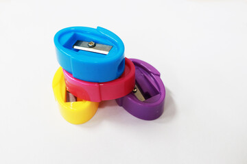 Photo of a colorful sharpener on a white background