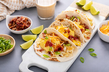 Breakfast tacos with hash browns, eggs and bacon