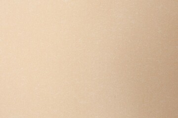 Texture of beige paper sheet as background, top view