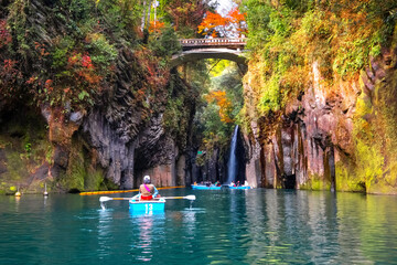 Miyazaki, Japan - Nov 24 2022: Takachiho Gorge is a narrow chasm cut through the rock by the Gokase River, plenty activities for tourists such as rowing and trekking through beautiful nature