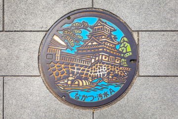 The Nakatsu castle in Oita prefecture engraved onto a manhole cover as a symbol of an important city's landmark