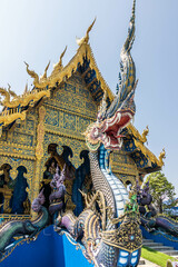 Fototapeta na wymiar Naga, Blue Temple, Wat Rong Suea Ten,