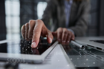 close up. businessman pressing his finger on the screen of the digital tablet