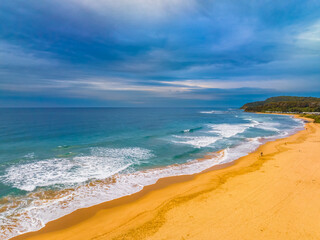 Aerial sunrise at the seaside with cloud cover