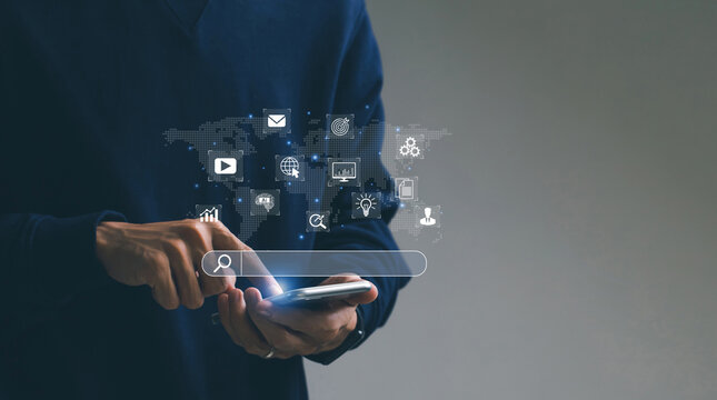 SEO Search Engine Optimization concept. Men use smartphone with SEO icons for promoting ranking traffic on websites and optimizing their websites to rank in search engines or SEO.