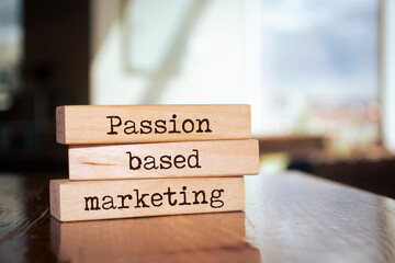 Wooden blocks with words 'Passion based marketing'.