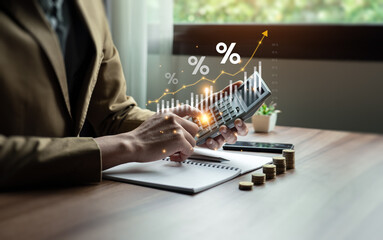 Interest rate and dividend concept, Businessman is calculating income and return on investment in...