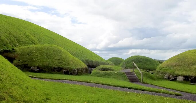 A 4K pan of the Neolithic  Heritage site of  3200 BC Burial grounds (Tombs)  at  Newgrange Knowth Co Louth Ireland