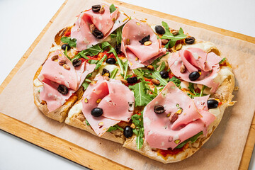 Roman pizza rectangular on wood background