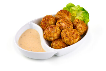 Baked ikea meatballs, isolated on white background.
