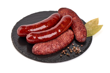 Grilled german bratwurst sausages, isolated on white background.