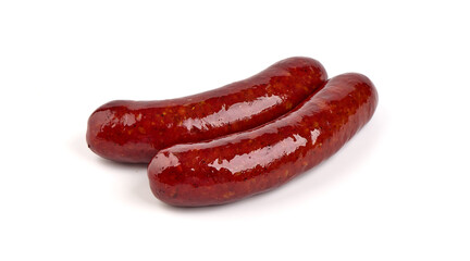 Grilled german bratwurst sausages, isolated on white background.