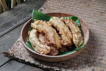 Fried jackfruit bananas on a plate. A portion of traditional food in Southeast Asia.