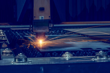 Laser cutting head for metal processing metal factory spark background, Processing and laser...