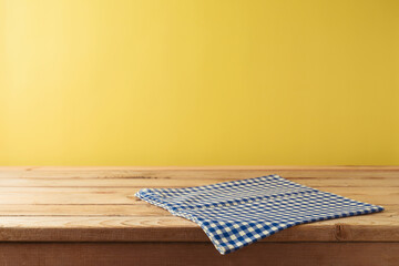 Brazilian Festa Junina summer harvest festival concept. Empty wooden table with tablecloth over...