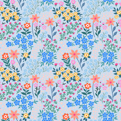 Seamless pattern. Romantic abstract floral pattern on a gray-blue background. Illustrations of spring nature with red, blue, pink, yellow and orange flowers.