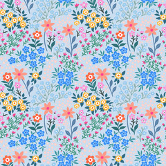 Seamless pattern. Romantic abstract floral pattern on a gray-blue background. Illustrations of spring nature with red, blue, pink, yellow and orange flowers.