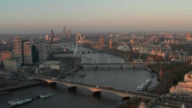 Aerial shot towards UK houses of Parliament London over the river Thames