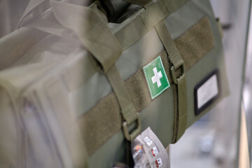 Bags for medical items and doctor's equipment. Army pouches and a holster with weapons for military...
