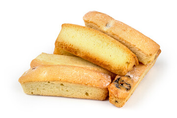 Sweet bread with raisins on a white background. A pile of cookies on a white background.