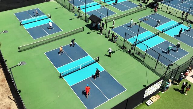 Pickleball tournament at a multi-court venue - aerial view