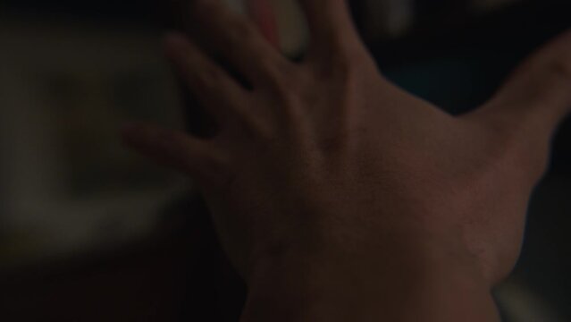 Person walking drunk at home at trying to grab something, POV view