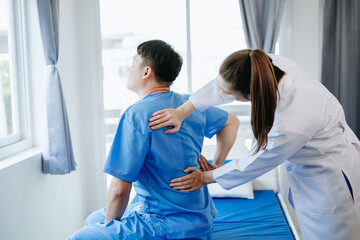 Doctor consulting with patient Back problems Physical therapy concept.
