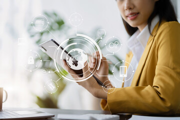 Person typing laptop computer and tablet with SDK icon on virtual screen. SDK Software development kit programming language technology concept in office.