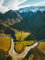 Aerial view Vjosa river bend and mountains landscape in Albania wilderness nature drone scenery  travel Balkans beautiful destinations - obrazy, fototapety, plakaty