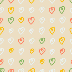 Seamless colorful hearts pattern. Abstract background with hand drawn doodle shapes.