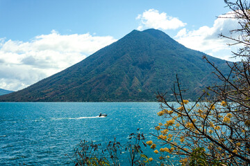 Boat and volcano, Lake Atitlan Guatemala