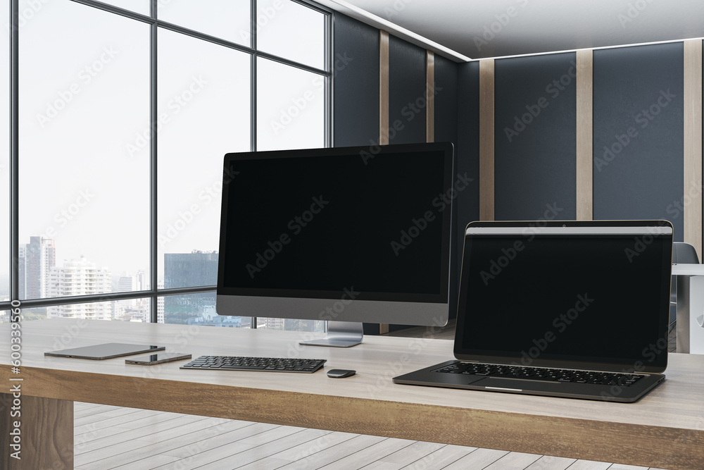Aufkleber Luxury designer office desktop with empty mock up computer screens, supplies and blurry interior with windows and city view background. 3D Rendering.