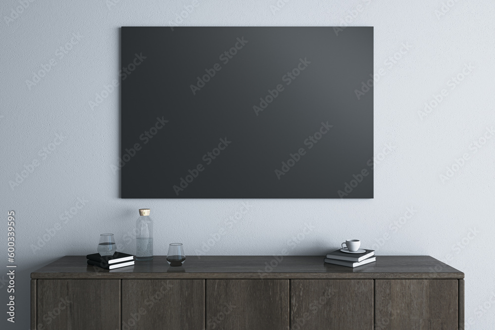 Poster modern wooden tv shelf with items and empty black mock up frame on light wall background. interior d