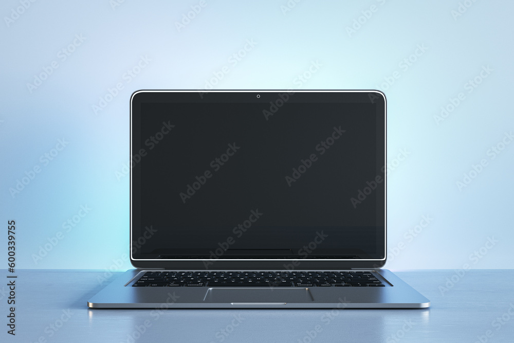 Poster creative blue designer workplace with empty black mock up laptop monitor. 3d rendering.