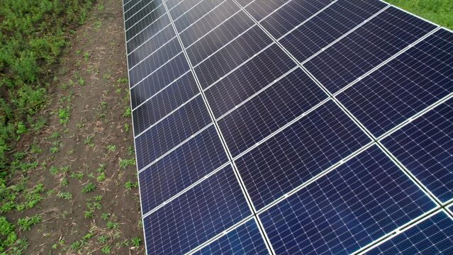 Ecology solar power station panels in the fields. Concept of green energy, electrical innovation nature environment.