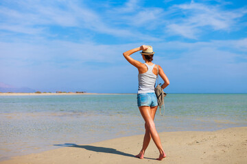 Tourist woman at the Red Sea, Sharm el Sheik, Sinai Peninsula, Egypt.