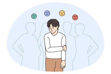 Sad guy feel lonely and uncomfortable in society. Unhappy young man suffer from solitude and loneliness in crowd, have various emotions. Frustration and depression. Vector illustration. - obrazy, fototapety, plakaty