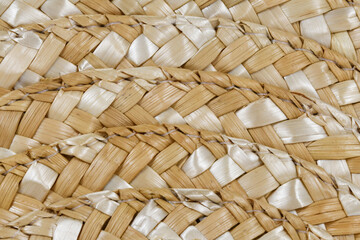 Close up of synthetic summer straw hat weaving