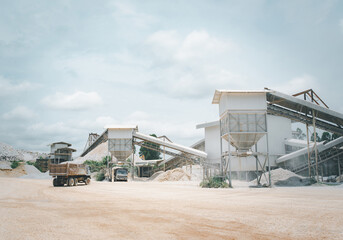 Front end loader at the limestone quarry, overall view of the machinery for crushing stone. mining...