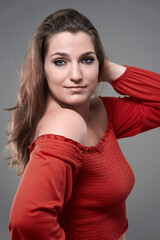 Fototapeta premium Confident plus size woman on gray background