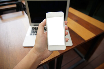 Close up of women's hands holding cell telephone blank copy space screen. smart phone with technology concept.