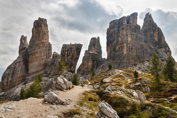 Beautiful unique view of Cinque Torri. View from the loop trail around 5 Torri rock formations. Landscape with all five towers. Dolomiti Ampezzane, near Cortina d'Ampezzo, Dolomites, Alps, Italy. 