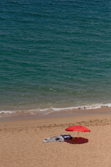 Sandy beach umbrella sea coast sunny day