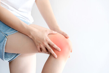 Woman having knee pain. Concept of health problems.