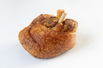 Homemade Crispy, Golden Deep Fried Pork Knuckle isolated on a white background. Clipping path.