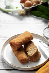 Polish traditional vegetarian krokiety snack served for breakfast. Croquet are filled with meet, fried in oil, and served as an appetizer, side dish, or dinner